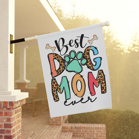 Dog Mom Garden Flag on porch showing Best Dog Mom ever design with colorful letters paw print and bones