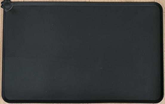 Durable Pet Feeding Mat in black, designed to keep food and water spills contained for easy clean-up