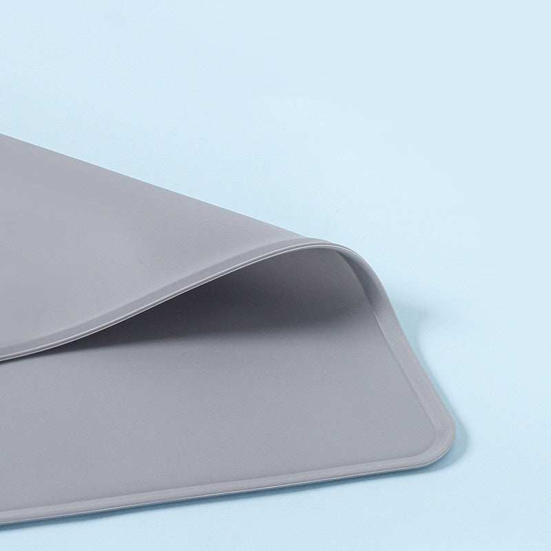 Silicone Pet Feeding Mat in grey designed to keep floors clean while pets eat
