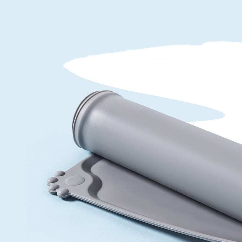 Gray Pet Feeding Mat designed to prevent spills while feeding pets at home
