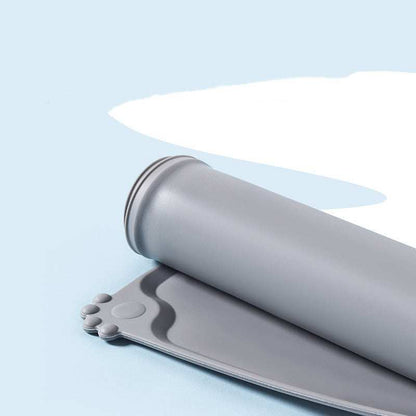 Gray Pet Feeding Mat designed to prevent spills while feeding pets at home