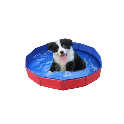 Purrfect Pet Haven Pet Outdoor Swimming Pool red foldable pool with blue interior and puppy cooling off