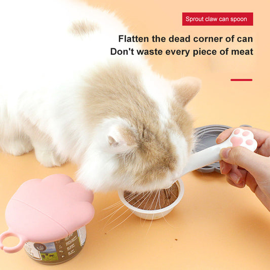 Wefulfil Scoop Spoon Jar Opener in pink used to scoop pet food from a can for a cat