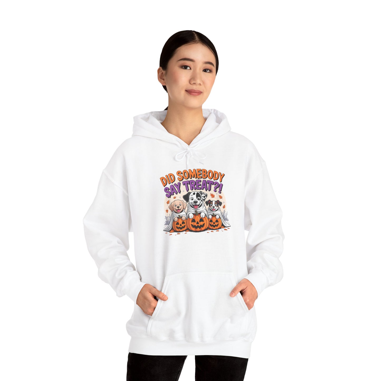 Printify white hoodie featuring three dogs with pumpkins and Did Somebody Say Treat text Halloween Dog Sweatshirt