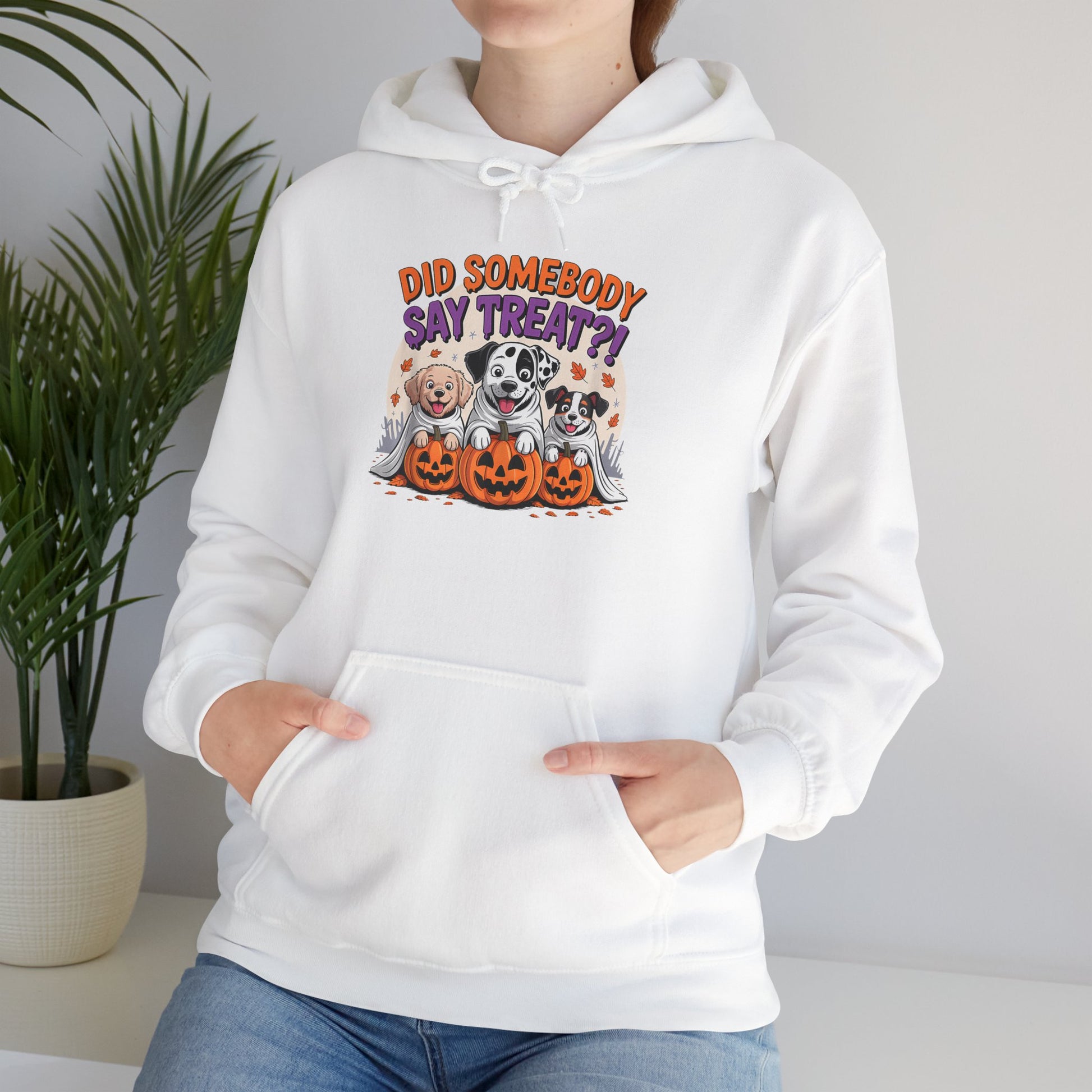 Printify white hoodie featuring Halloween Dog Sweatshirt design of three dogs with pumpkins and fall leaves
