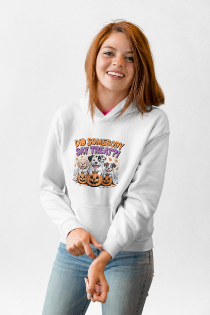 Printify white hoodie featuring Halloween Dog Sweatshirt graphic with three dogs in jack o lanterns and treat text