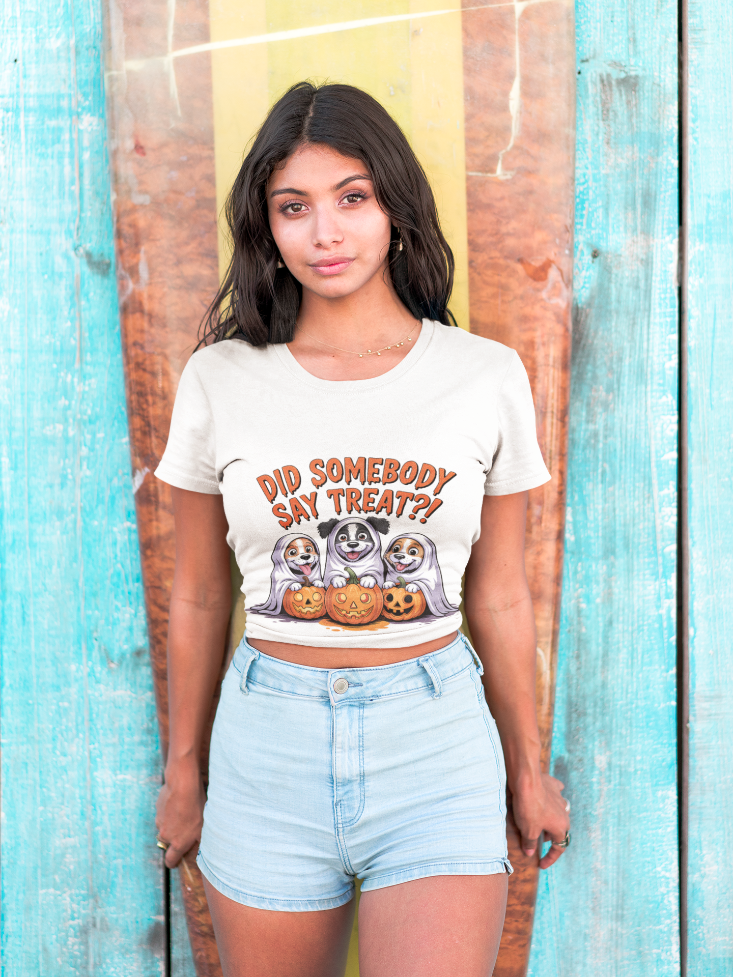 Spooky Halloween Dog Tee on model white cropped T shirt with ghost dogs pumpkins Did somebody say treat print