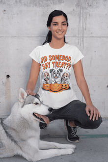 Spooky Halloween Dog Tee worn by smiling woman with husky and cartoon ghost dogs with pumpkins