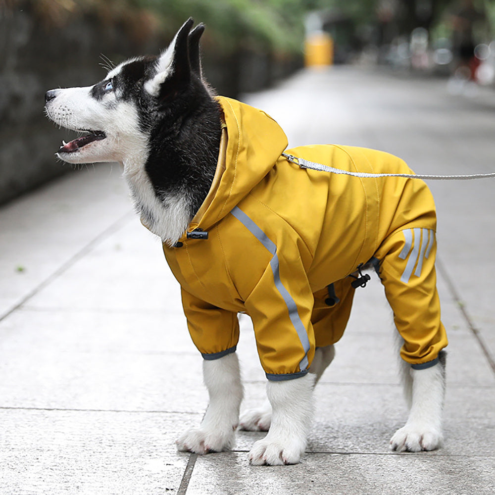 Wefulfil waterproof dog raincoat with hood on a Siberian husky in yellow with reflective stripes on sidewalk
