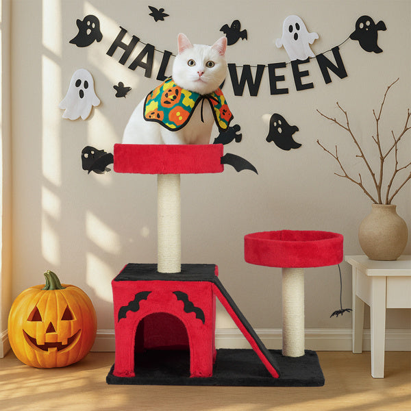 Wefulfil Gothic Cat Tree in red and black with Halloween decorations and a white cat wearing a pumpkin cape