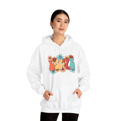 Animal Lover Hoodie white unisex hoodie with colorful paw and flower design worn by model with hands in pockets