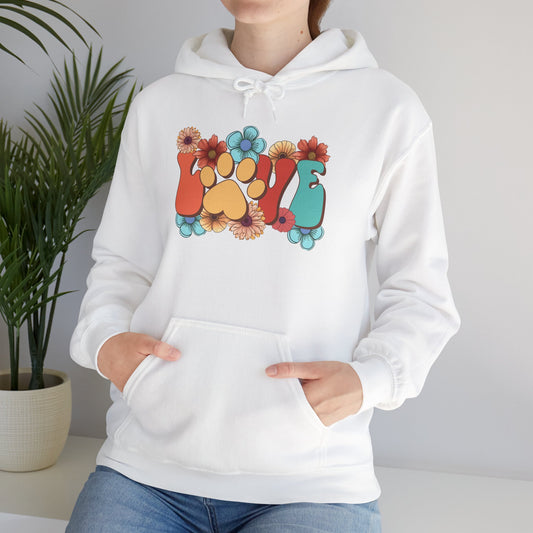 Person wearing white Animal Lover Hoodie with colorful floral LOVE design featuring paw print center